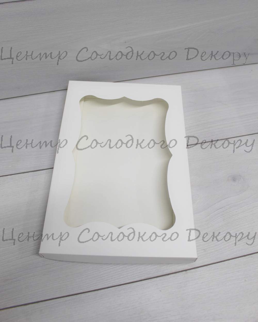 картинка Коробка для пряників з віконечком, з білого картону 20*30*3 от магазина Центр Солодкого Декору