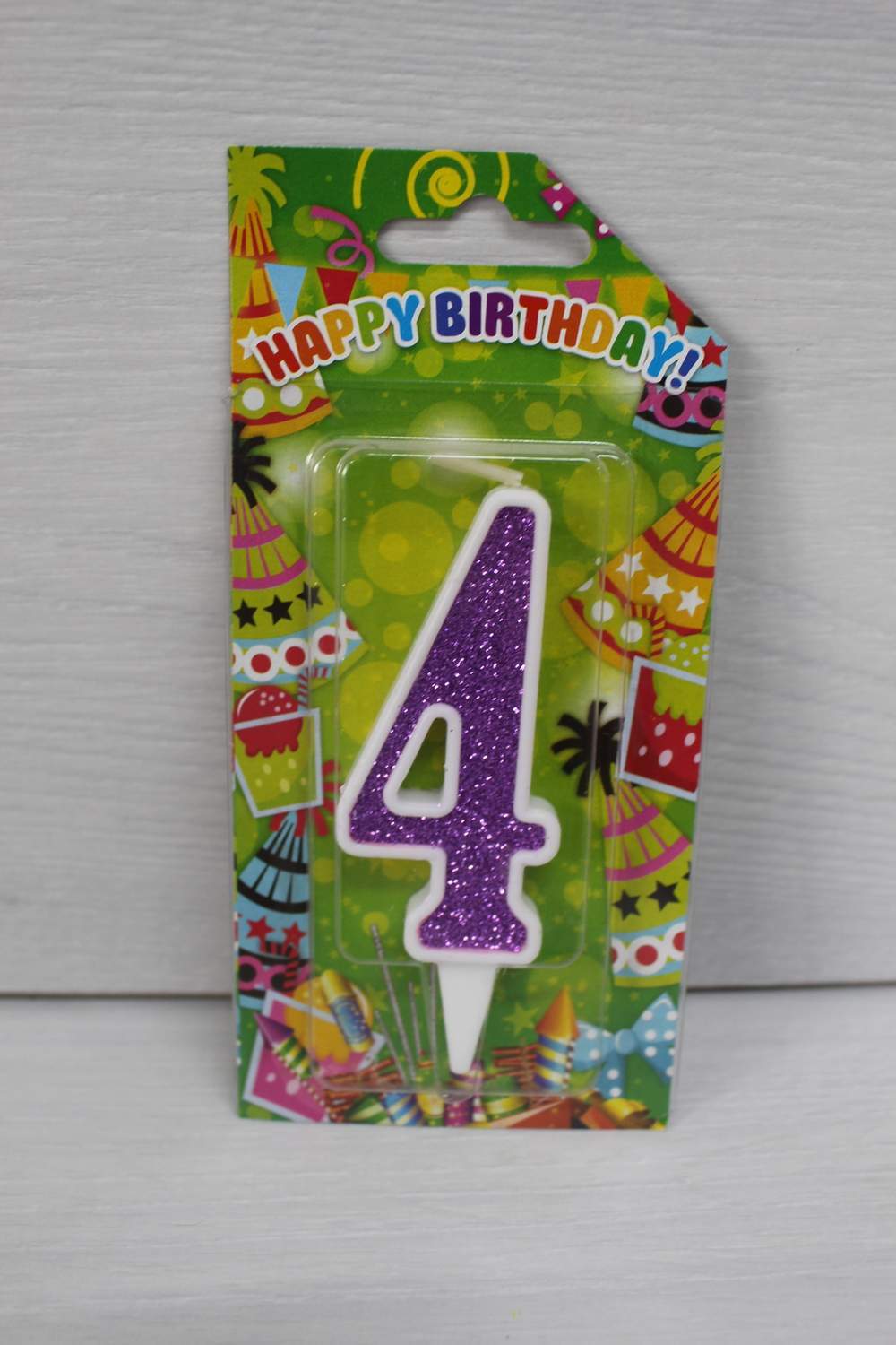 картинка Свічки для торта цифра "4" біла, фіолетовий глітер. в магазині Центр Солодкого Декору